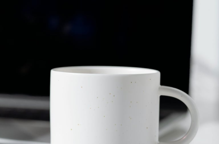 My Happy Place Crafts LLC | Plain, white, ceramic coffee mug next to laptop