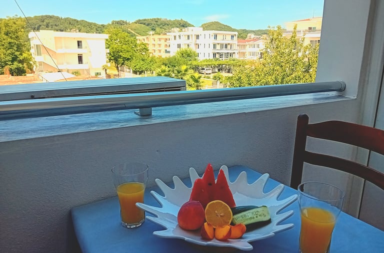 a table with fruit and juice on it