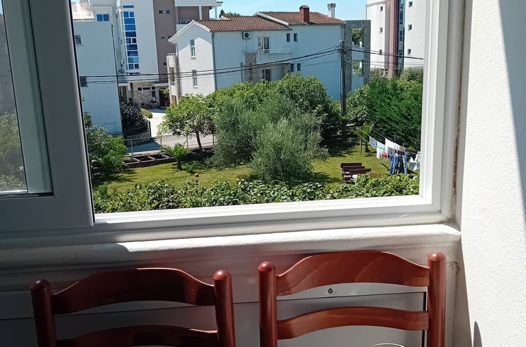 a kitchen with a refrigerator and a refrigerator freezer
