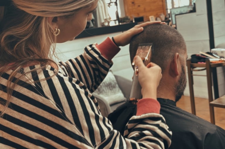 stylist cutting mens hair at Meraki and Co salon and spa greer sc 