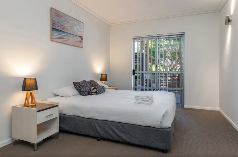 Master Bedroom with Queen bed at low height for accessibility.