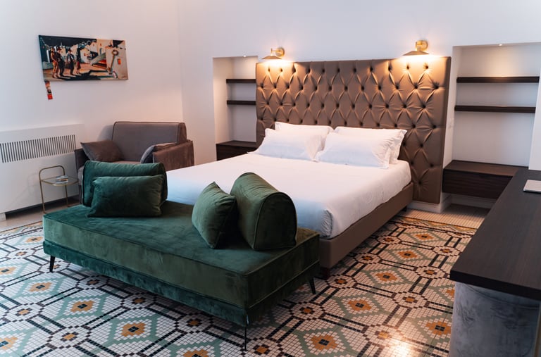 a bed room with a bed and a couch