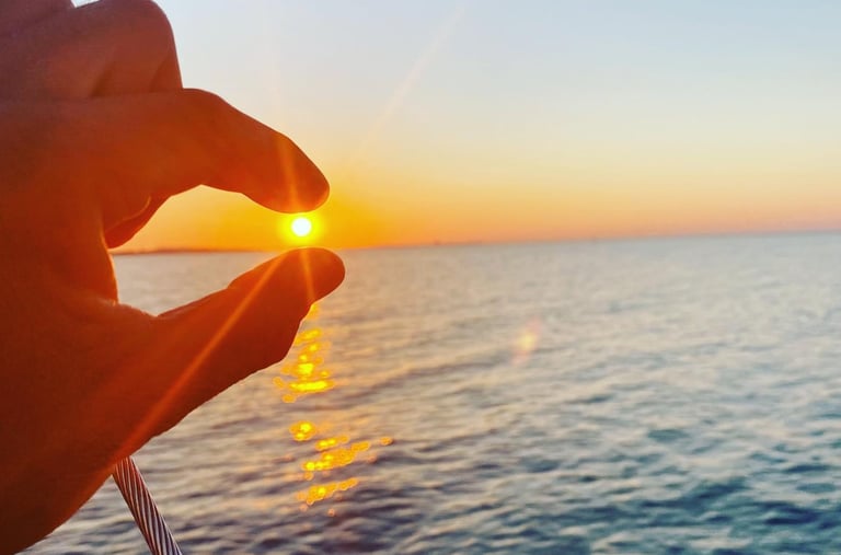 Tramonto in mare, emozioni in barca, Cattolica