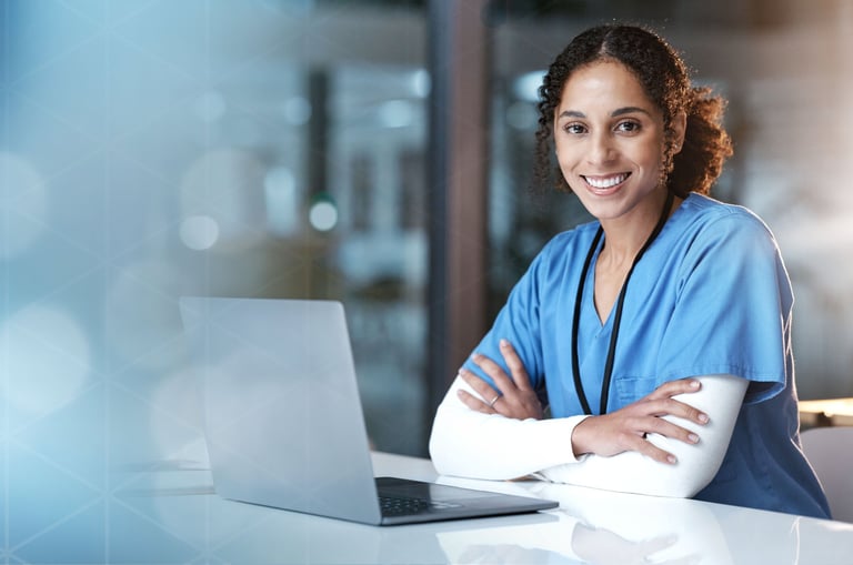 A female clinician with a computer