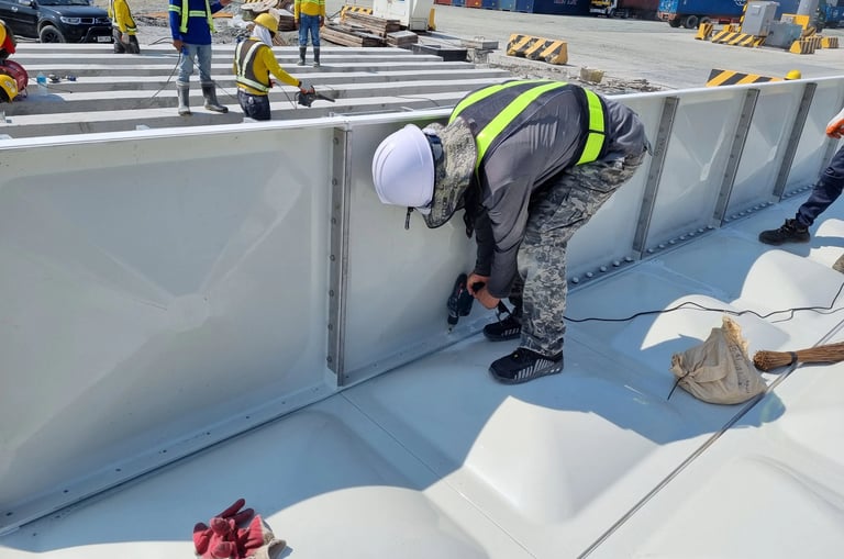 GRP Sectional Water Tank Side Panel Installation from above the Bottom Panel