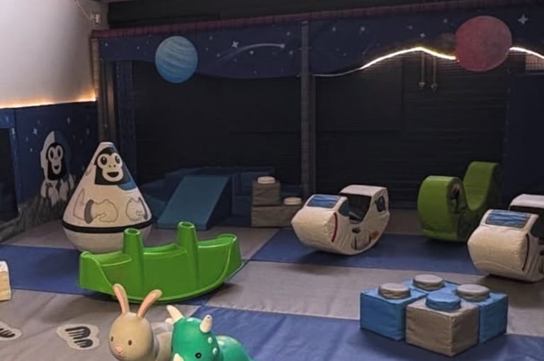JustPlay baby and toddler softplay section with soft rockers wall puzzles hoppers and foam slides