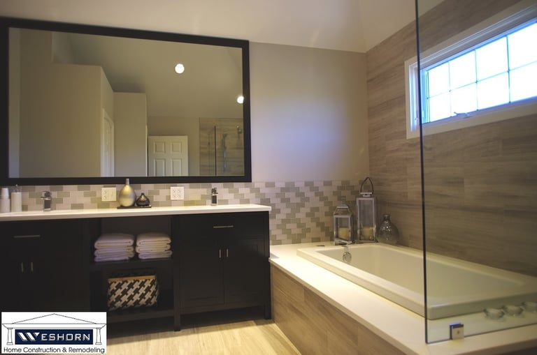 Modern bathroom remodeling project with custom walk in shower & soaking bathtub in Northbrook IL.