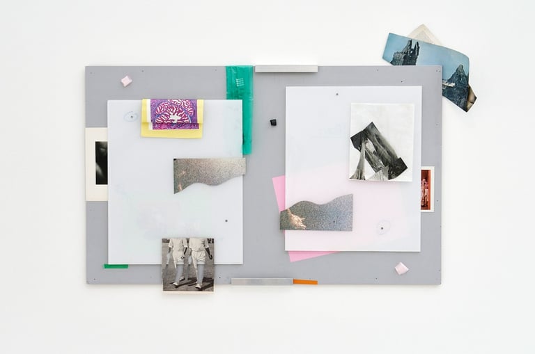 Karl Russell Vickers a notice board with fragments of pictures, paper cutouts and leftover tape