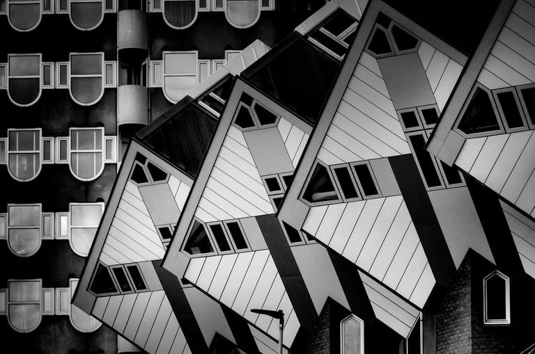 Interlocking cubic house facades by Martin Wacker, abstract geometric patterns in sharp black and white.