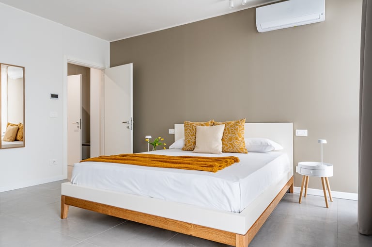 letto king per soggiorni brevi confortevoli con aria condizionata