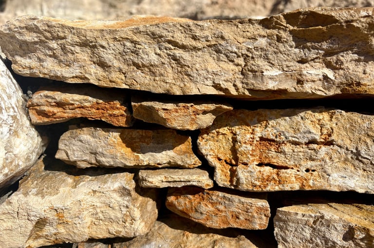 freestack limestone wall—built without cement using traditionaAncientl dry-stack method | AquaVitae