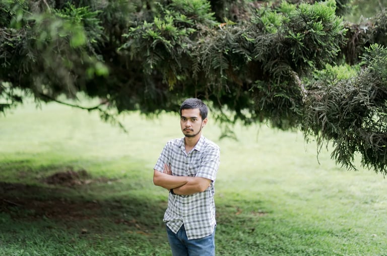 Old Brother portrait photographed in the natural greenery of Botanical Garden Bedugul Bali.