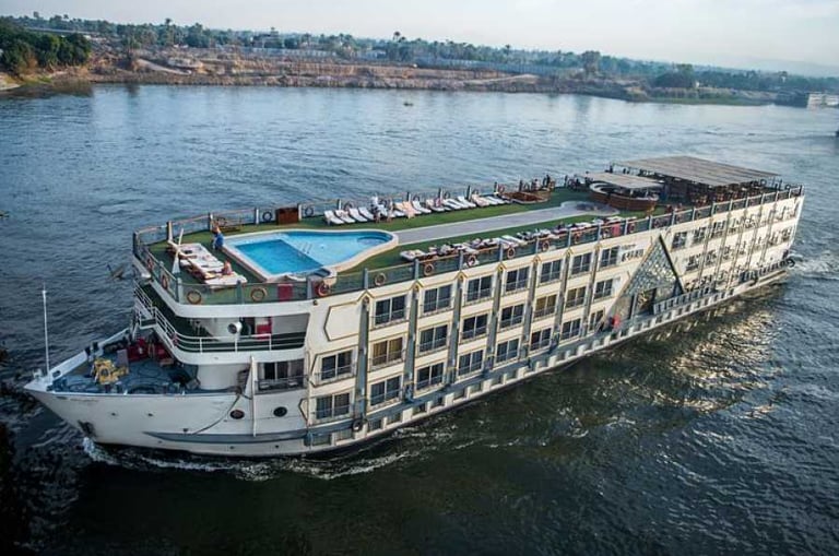 a large boat with a pool in the water