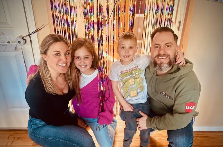 Tom Trotta with his wife and children, sharing their journey with ADHD and learning differences
