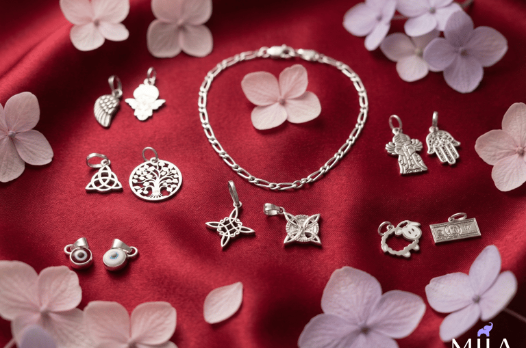 a bunch of jewelry on a red cloth