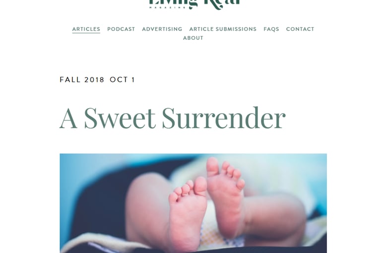 Close-up of newborn baby feet for the Living Real Magazine article A Sweet Surrender.