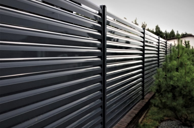 a fenced in area with a fence and a fence