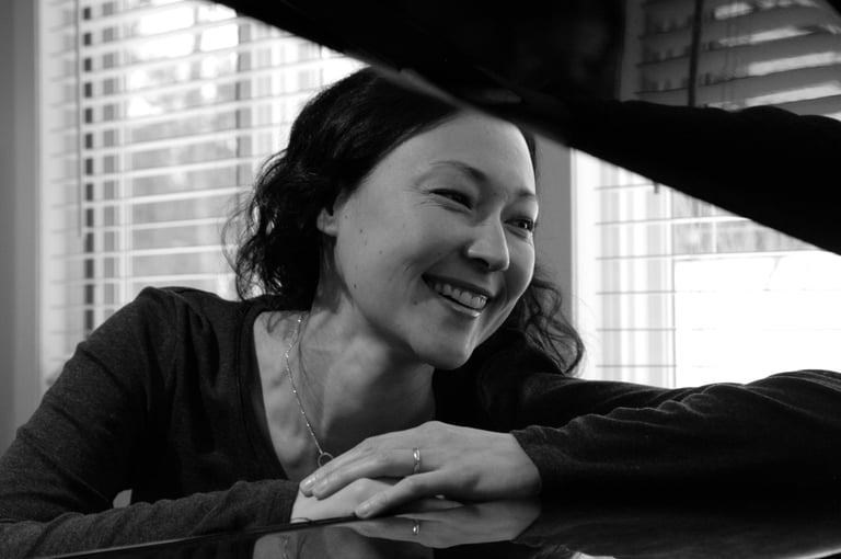 Composer and Educator Jen Smith Lanthier at a grand piano