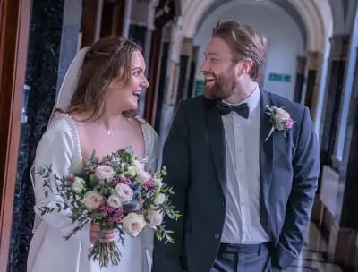 Newly-weds leaving the ceremony room