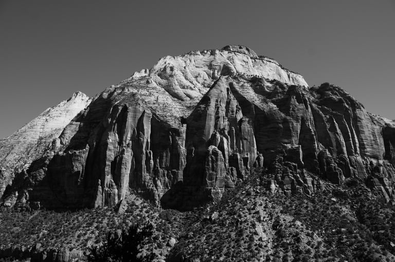 a mountain side view of a mountain with a mountain in the background, located in Utah