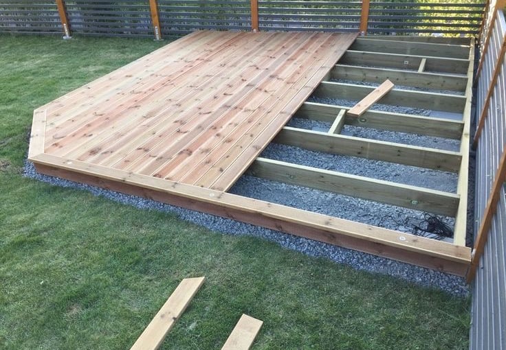 a deck deck with a deck and stairs