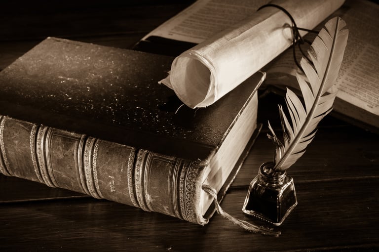 old book, papyrus scroll, quill pen