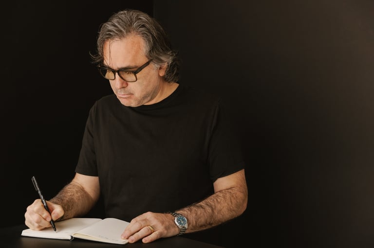 Michael Fergusson writing a letter