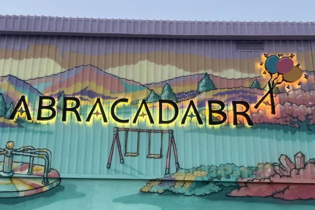 Abracadabra 3D Acrylic signage mounted on their wall