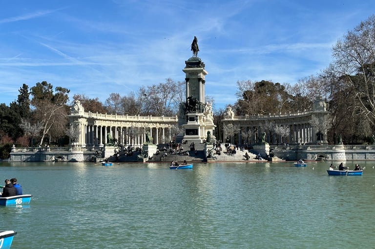 The monument to Alfonso XII behind a lake