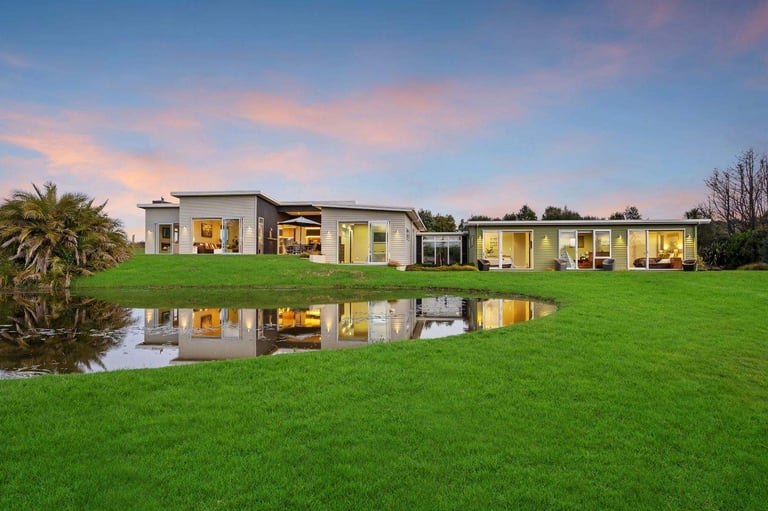 new addition countryside mono pitched weatherboard home, existing garage