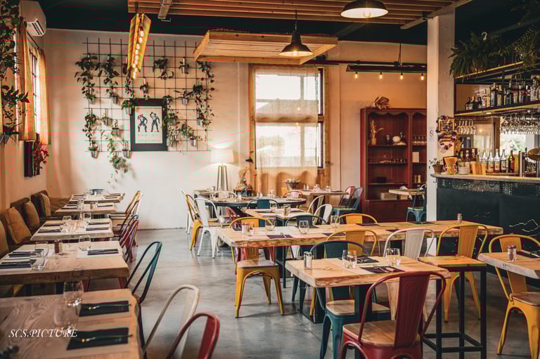 a restaurant with a bar and a bar with a bar