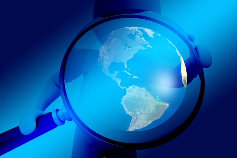 a magnifying image of a globe in the foreground