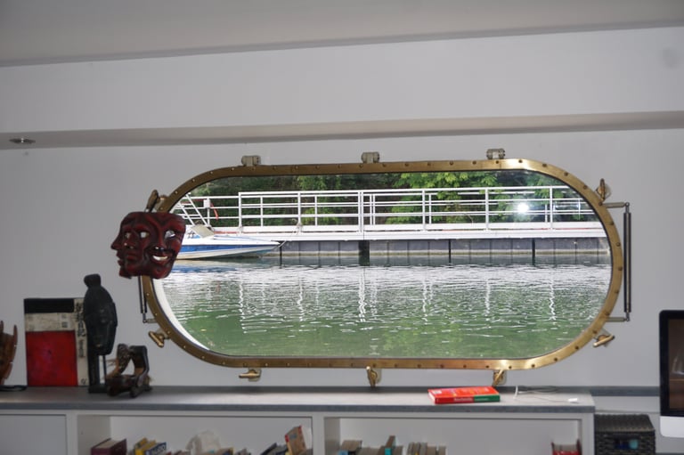 Opening oblong ship window on a dutch barge