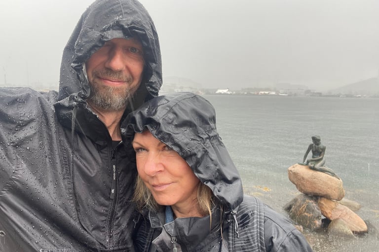 a wet copenhagen and the statue of the little mermaid, Denmark