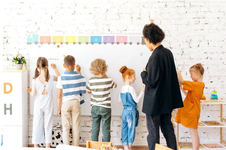 a teacher teaching children in a classroom