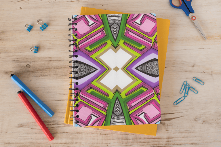 a notebook with a notebook and a pen and pencils