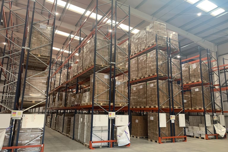 tall pallet racking in narrow aisle configuration with rack end protectors  