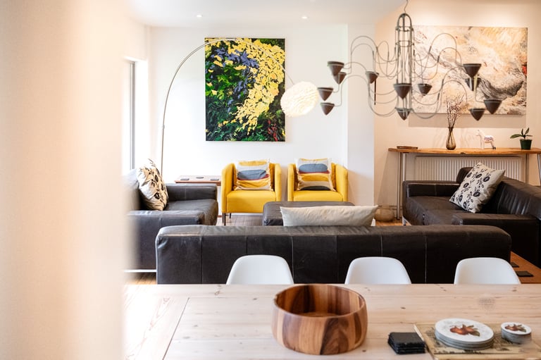 a living room with a couch and a table