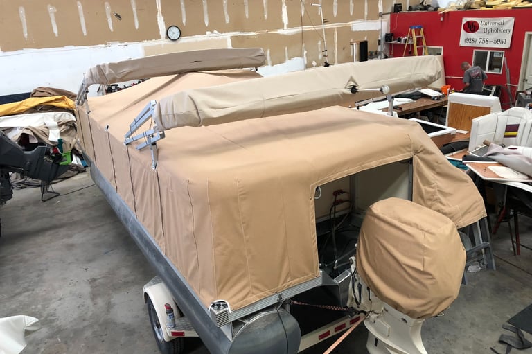 Snap down pontoon boat cover with cutouts for Bimini top