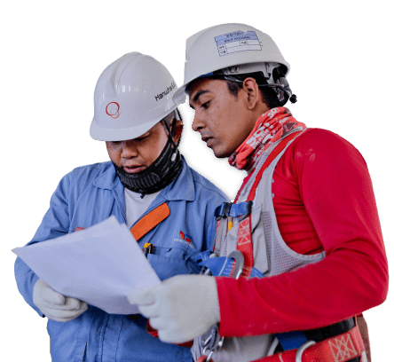 Engineers reviewing site drawings