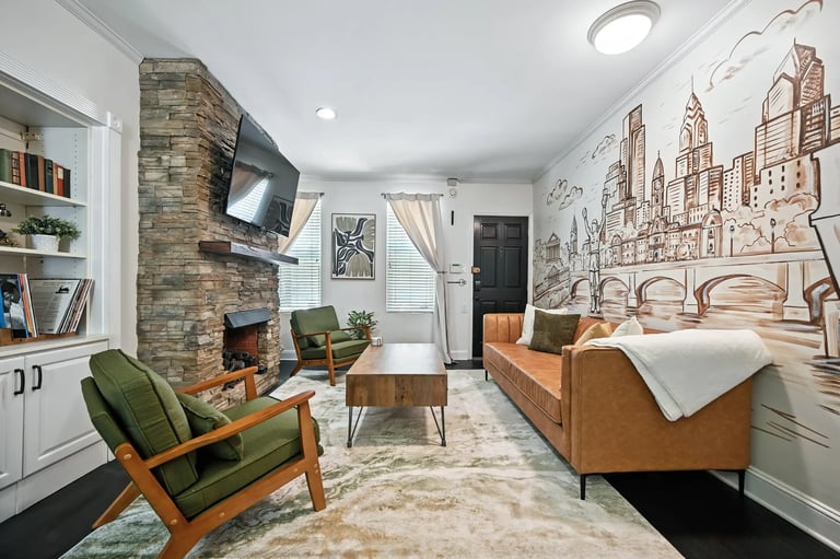 Airbnb living room with mural wall