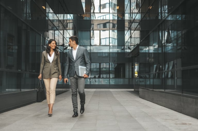 Business professionals, walking through office building with cloud base cameras, monitoring premises