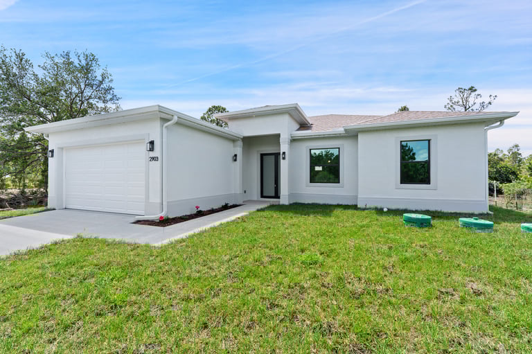 Beautifully designed front elevation of a new home for sale in Lehigh Acres, Florida.