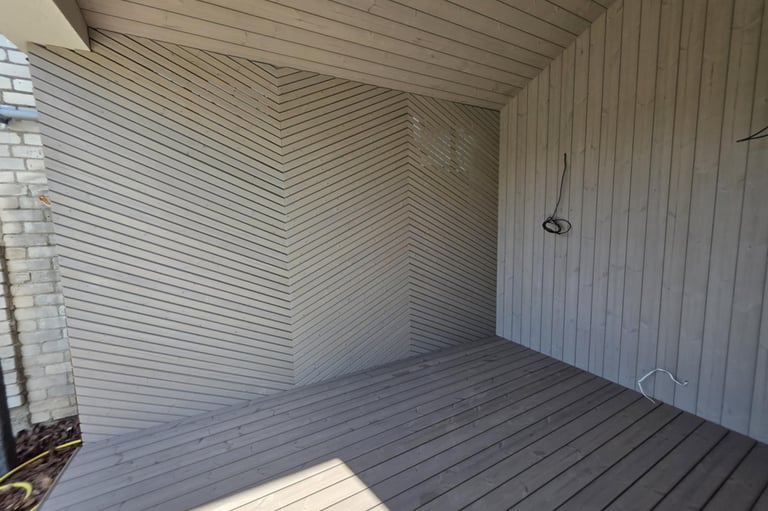 a room with a white brick wall and a white brick wall