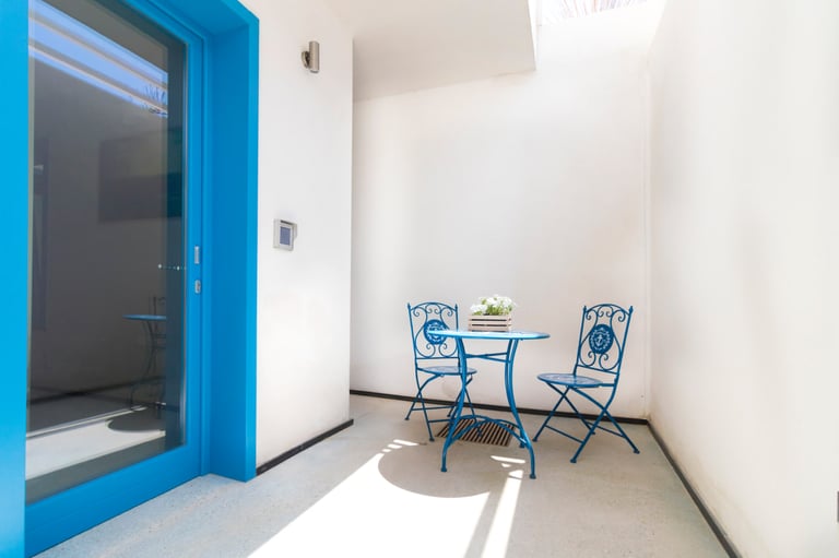 a table with a table and chairs in a room