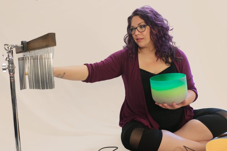 rachel in a sound bath, white background