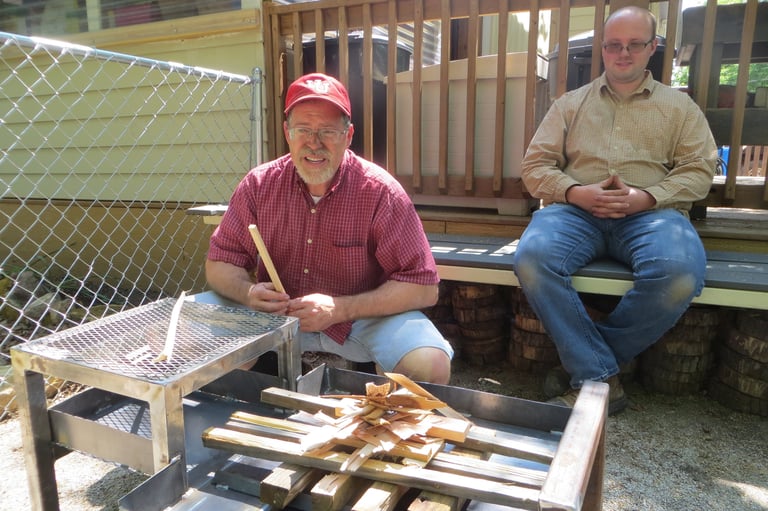 Two men at the fire pit