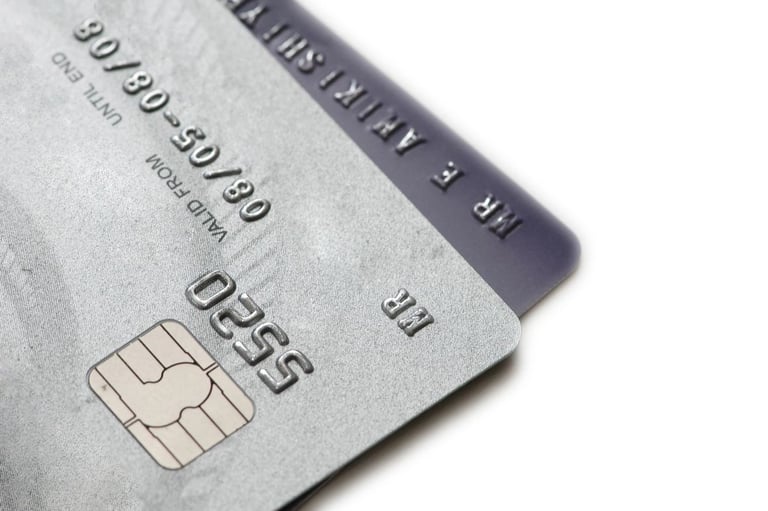 a credit card with a credit card attached to it