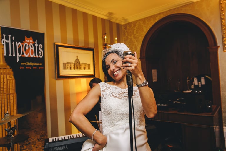 The Hipcats - bride at wedding chooses 1920s, 1930s, Gatsby jazz and swing band for wedding. Band for hire for vintage event