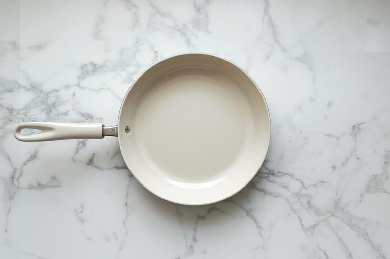 Is ceramic coated cookware safe — light colored ceramic pan on marble surface